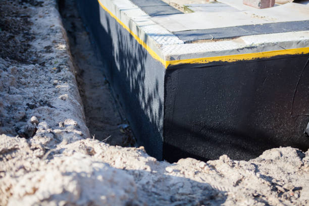 Professional Exterior Waterproofing technician working in Columbus, MN
